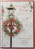 Caring Message Lantern And Wreath Design Christmas Card